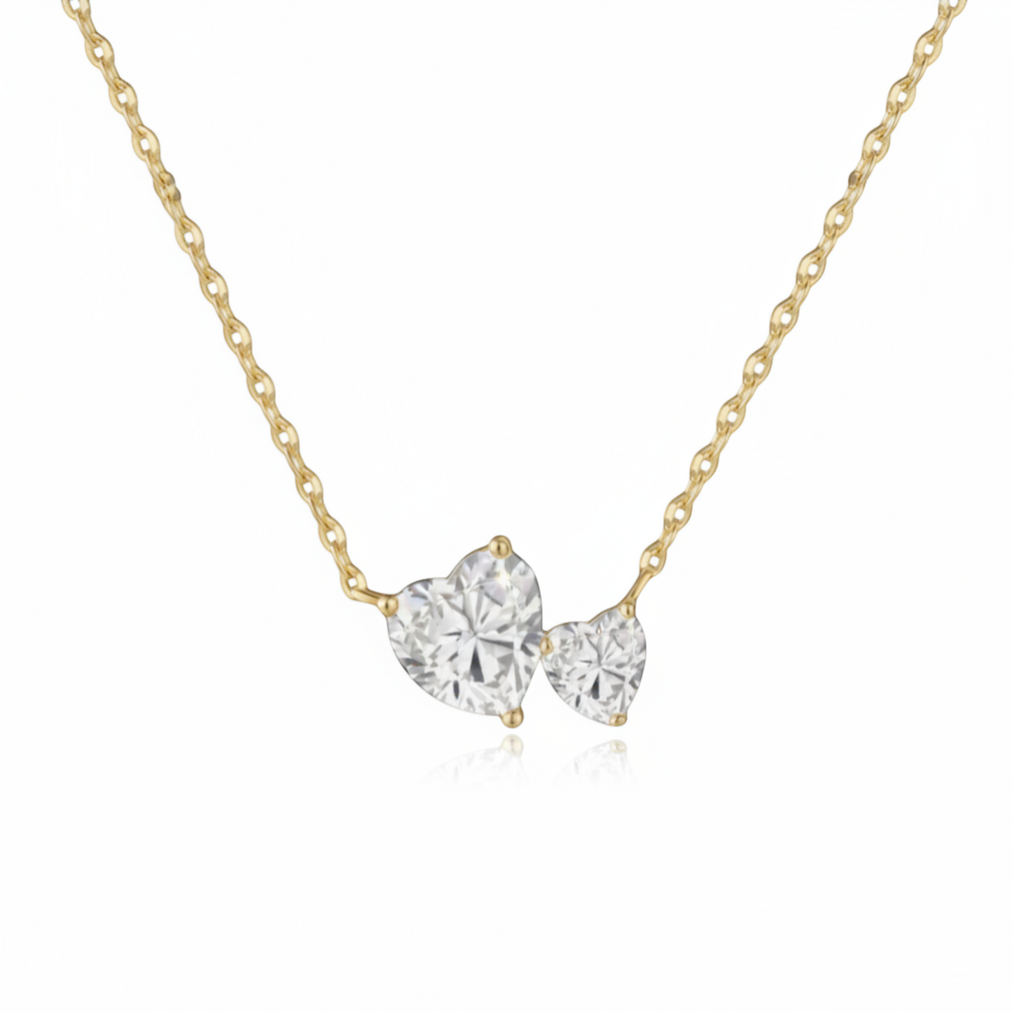 Scandal Kiss Double Heart Gold Necklace with two heart-shaped stones on a delicate 18ct gold plated sterling silver chain.