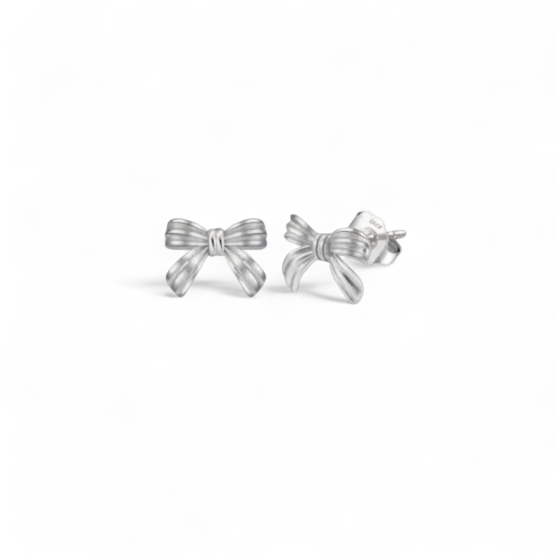 Bow Stud Earrings in sterling silver with White Gold plating, sculpted bow silhouette