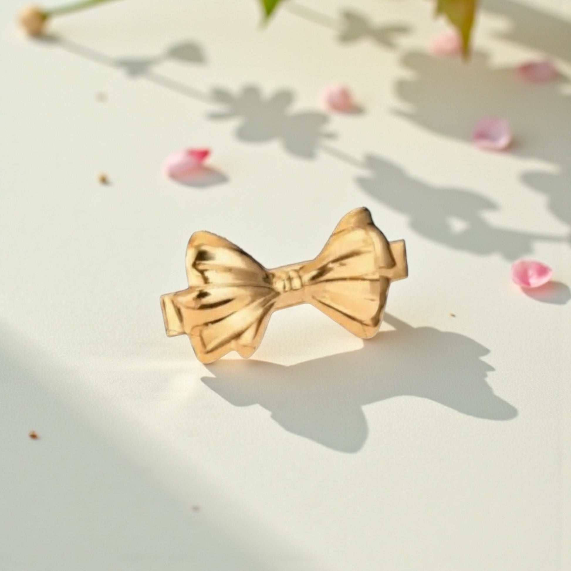 Golden Bow Hair Clip - polished 18ct gold bow hair accessory