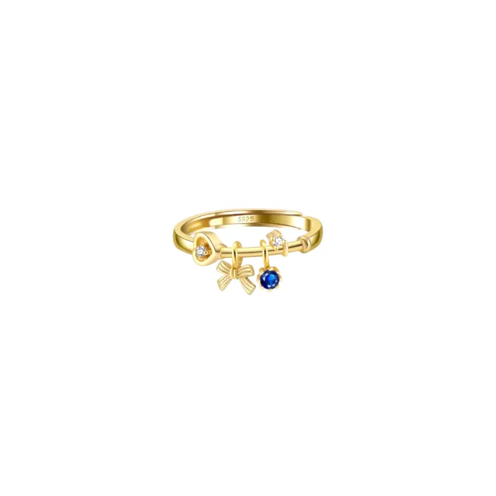 Blue Stone & Bow Charm Ring Rings