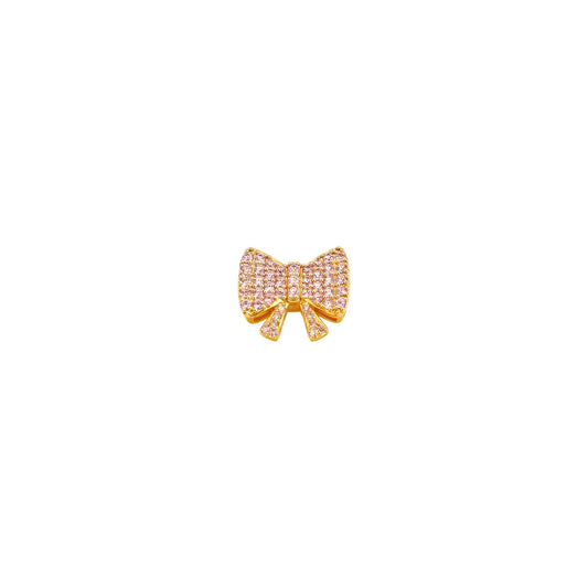 Scandal Kiss Bow Bliss ScanJewel with a sculpted gold bow design and sparkling light pink stones