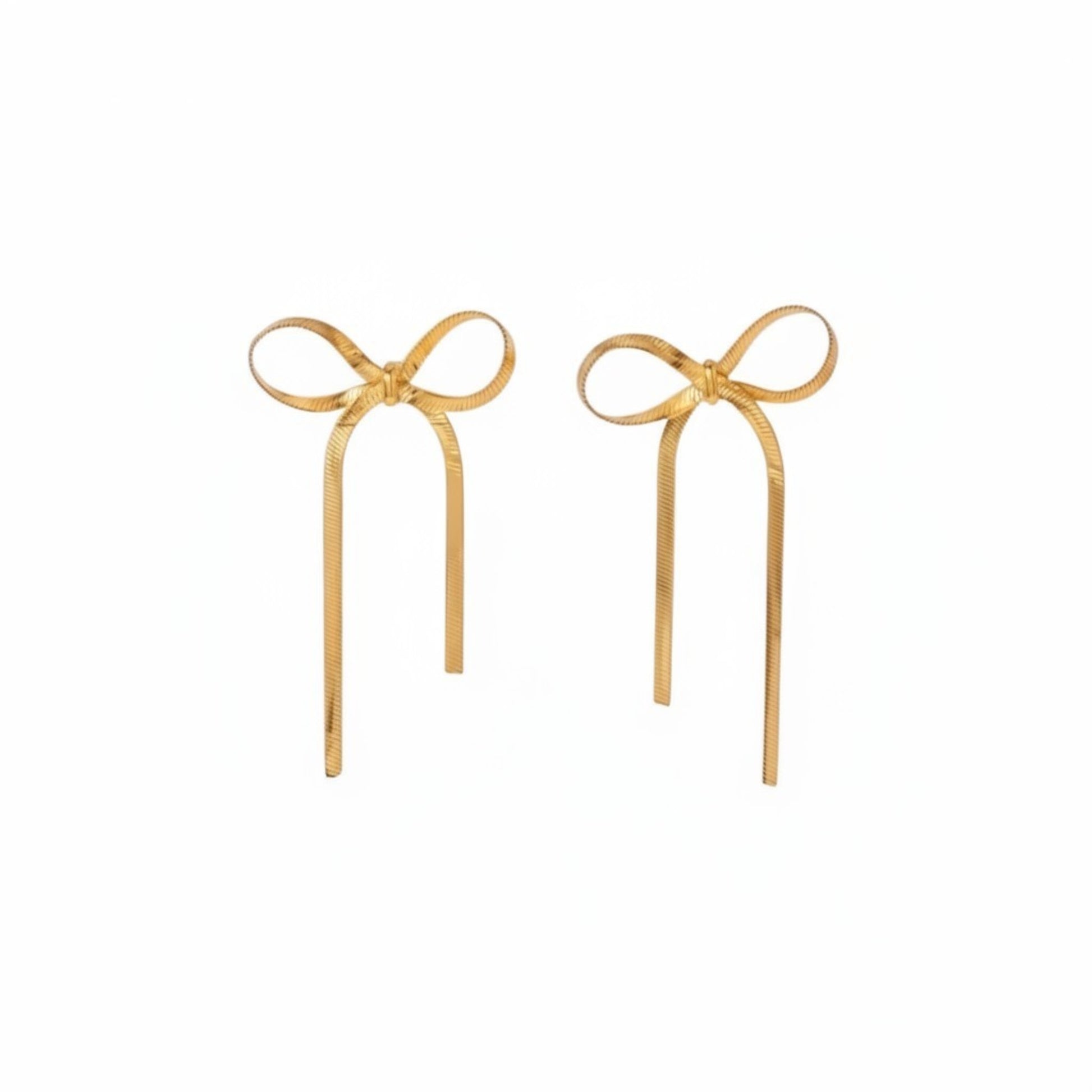 Gold long bow ribbon stud earrings with an elongated sculptural silhouette