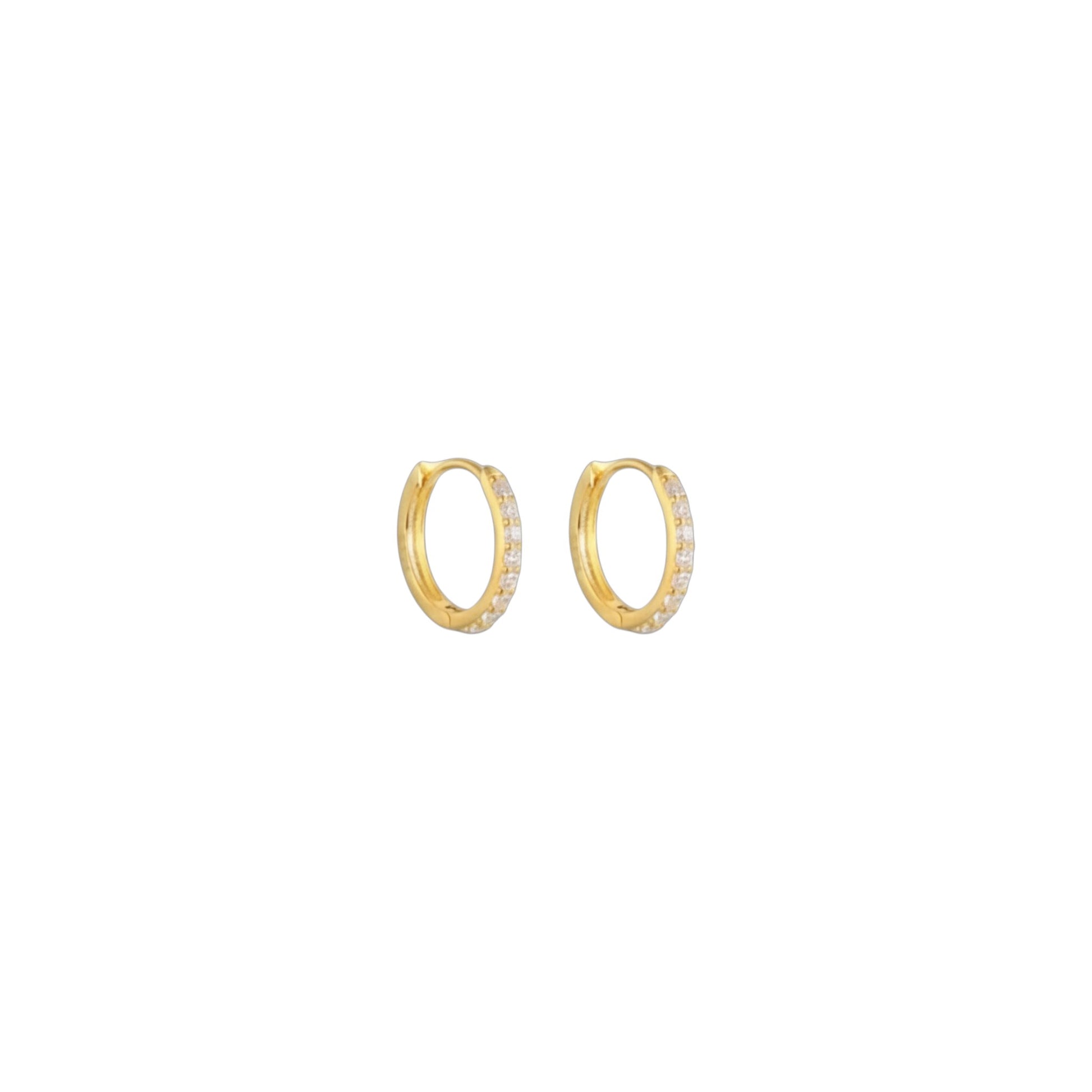 Gold micro pavé huggie earrings in sterling silver with zirconia detailing
