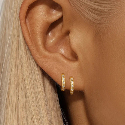 Gold stone detail huggie earrings in sterling silver with zirconia detailing