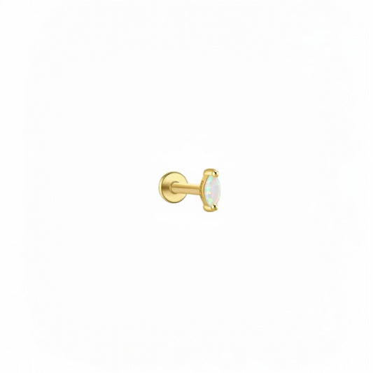 Gold iridescent cartilage stud earring with luminous crystal stone.