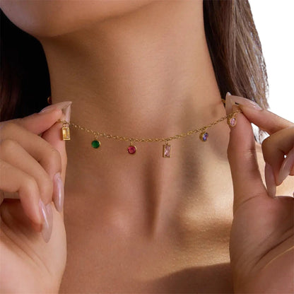 Scandal Kiss gold plated stainless steel necklace featuring a delicate chain with vibrant multi-shaped colourful stones