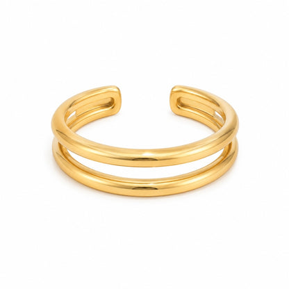 Scandal Kiss gold double band bangle in polished 18ct gold plated stainless steel with a sleek open design.