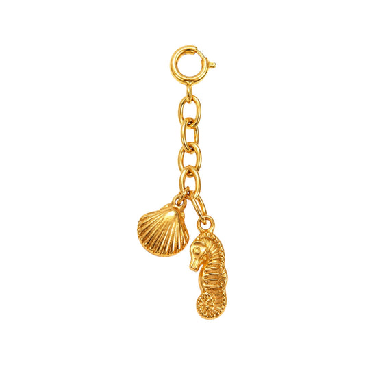 Scandal Kiss gold-plated stainless steel bikini charm featuring a dangling seashell and seahorse on a link chain.