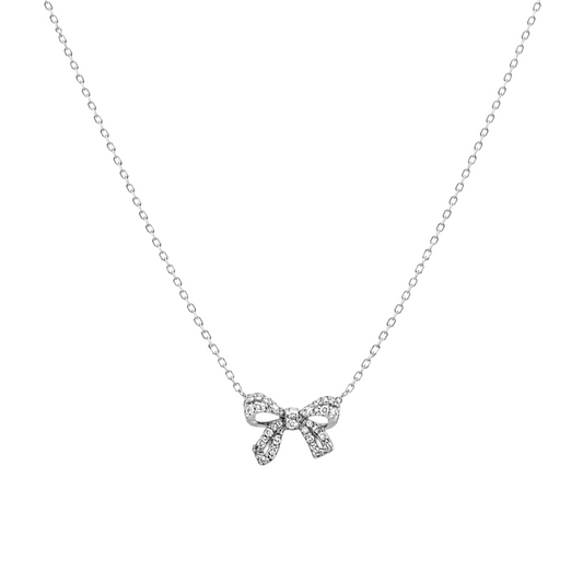 Petite Pavé Bow Necklace in 925 Sterling Silver with Rhodium plating featuring an elegant petite bow adorned with brilliant pavé zirconia