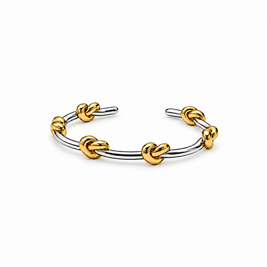 Two-Tone Knot Cuff Bracelet with intertwined gold and silver detailing